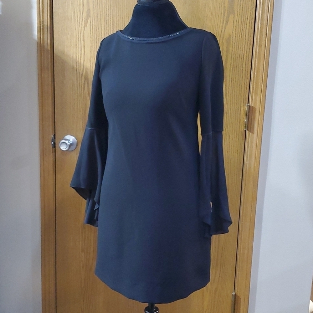 Elie tahari black flutter sleeve with raw hem neckline and a touch of bling